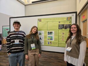 Elliott Stern-Frisenfelds, Sophia Stang ('26), and Hanna O'Reilly presenting their poster at the Ecological Society of America Great Lakes Branch Meeting in April 2026.