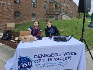 WGSU staffers Giulyana and Liam sitting at WGSU Day