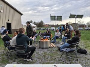Students at bonfire - 2026 Earth Day Celebration