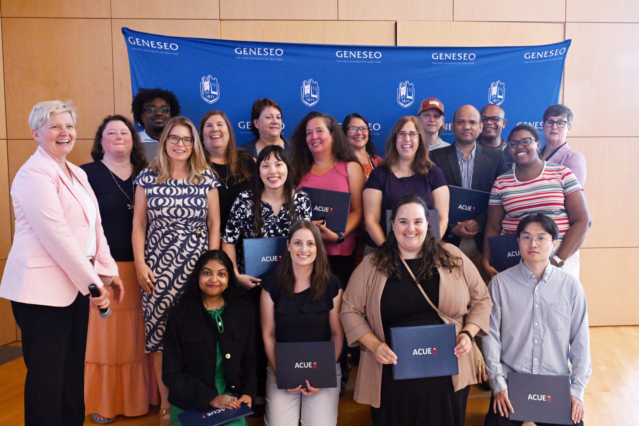Members of the ACUE teaching certification and ACUE and College administration.