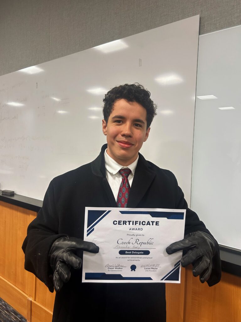 Alexander Healy holds his best delegate award for the Czech Republic.