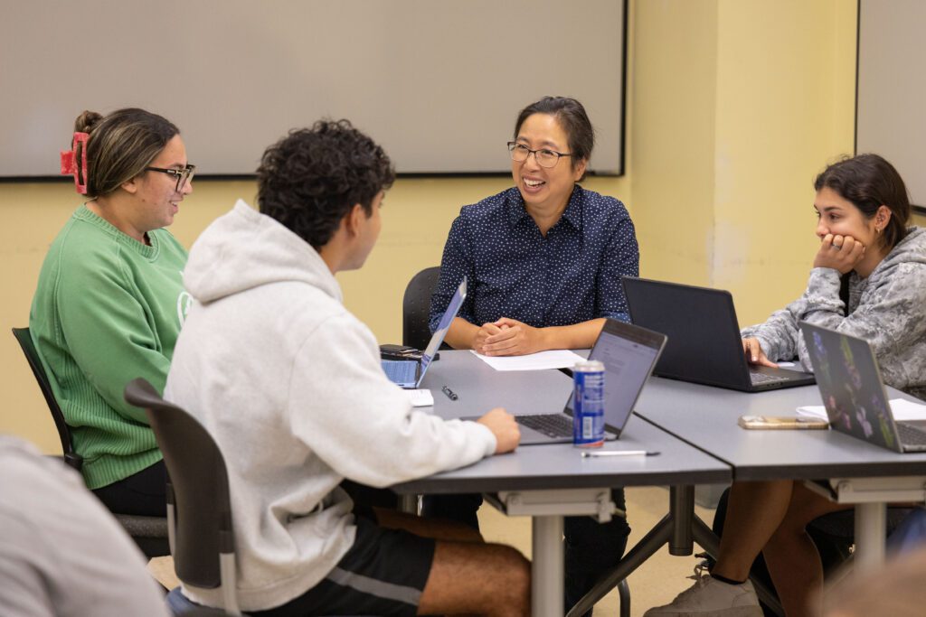 Biology professor Suann Yang leads a class
