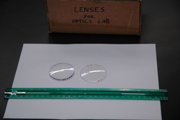 lenses and ruler on paper