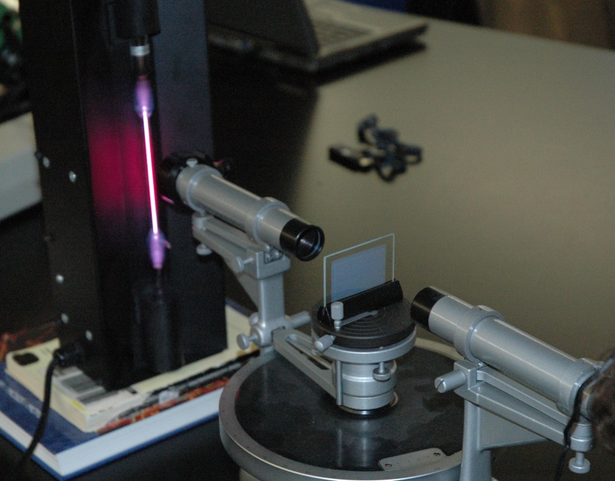 spectrometer aimed at hydrogen gas tube